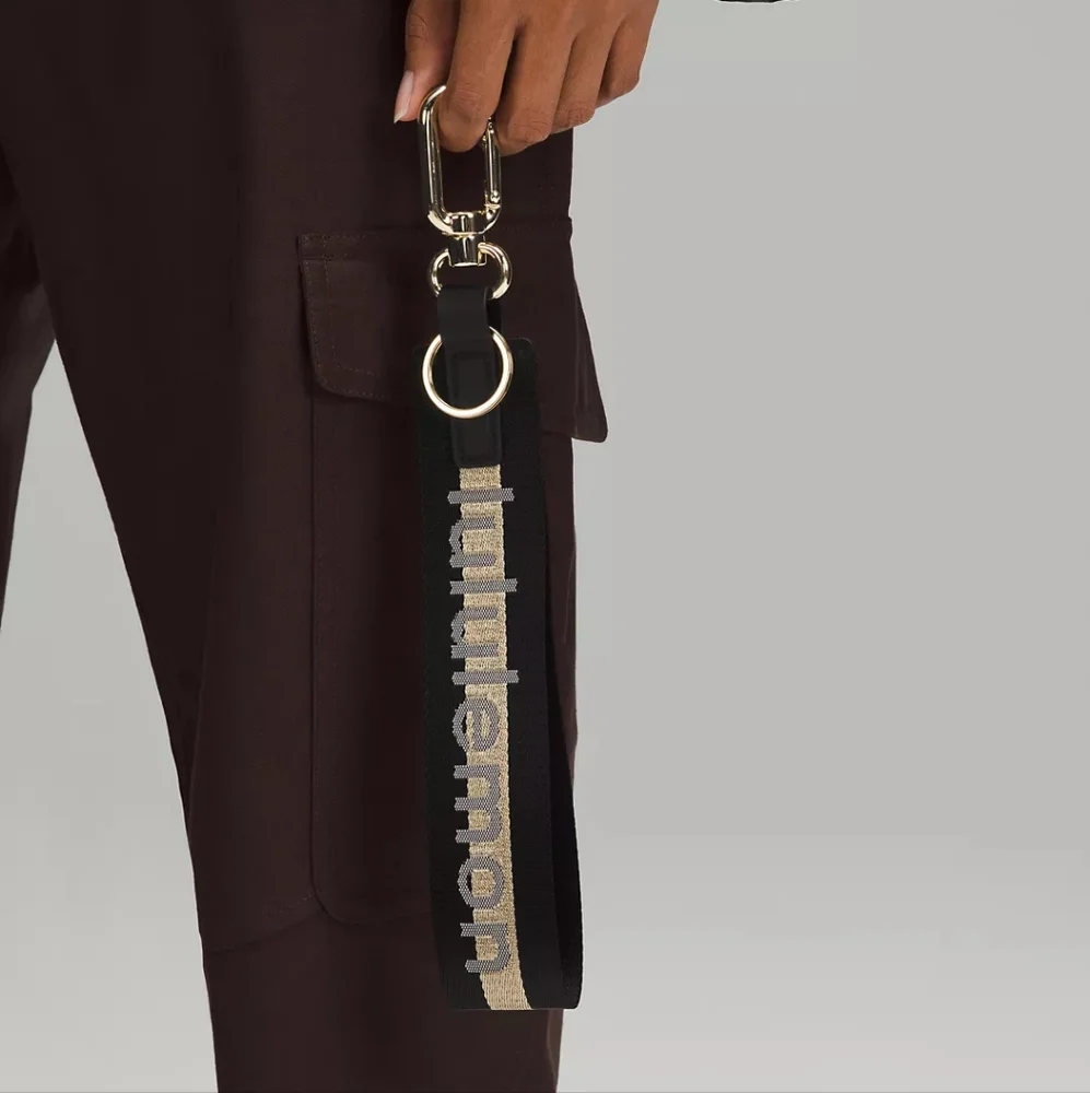 Lululemon Gold/Black Never Lost Keychain - Picture 2 of 6